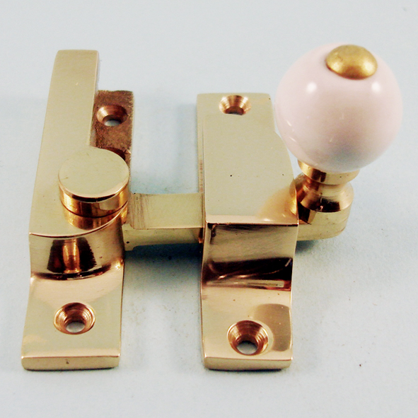 THD104N/PB • Non-Locking • Polished Brass • Narrow Straight Arm Ceramic Knob Sash Fastener